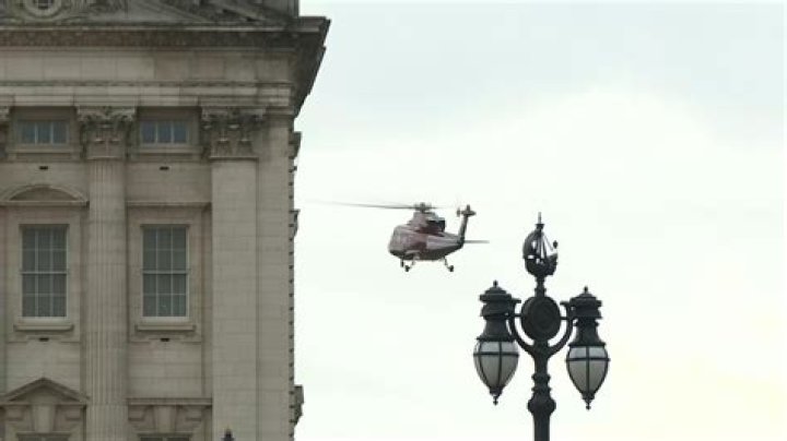 Flying High: The Sight Of A Helicopter Over Buckingham Palace