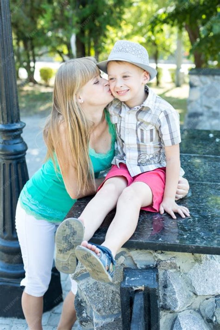 Unbreakable Bonds: The Heartwarming Moment Of A Mom Kissing Her Son